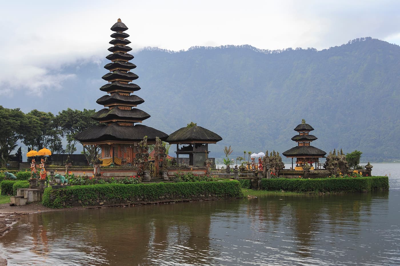 The tiered shrines of Pura Ulun Danu Bratan standing on the shore of Lake Bratan in the Bali highlands.